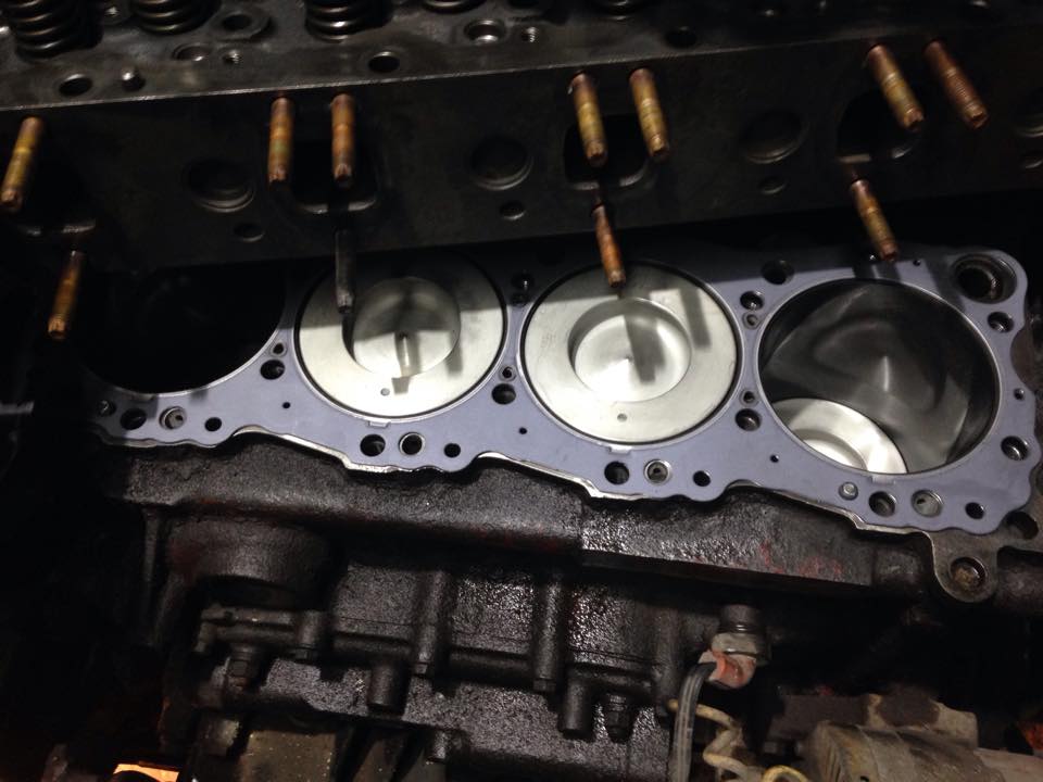 Pistons — block and gasket